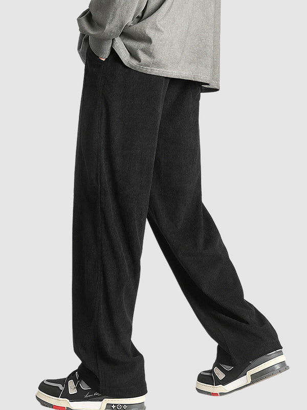 Męskie spodnie casual w prążki – detal troczka w pasie